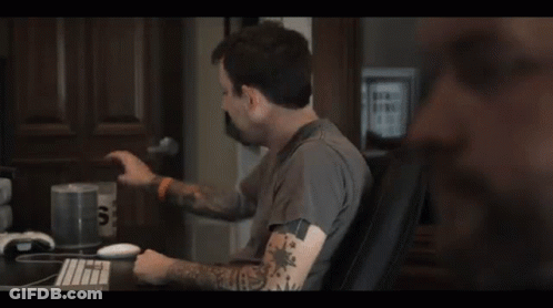 Man Holding Cup Saying Tips GIF