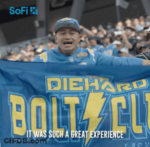Man Holding Diehard Bolts Flag In Crowd GIF