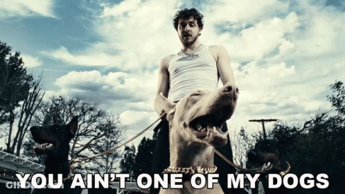 Man Holding Dog With You Ain't One Of My Dogs GIF