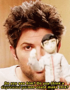 Man Holding Doll Saying Do You See Him GIF