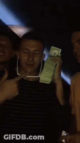 Man Holding Dollars Next To Man In Sunglasses GIF