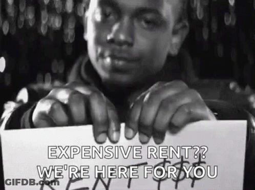 Man Holding Expensive Rent Sign GIF