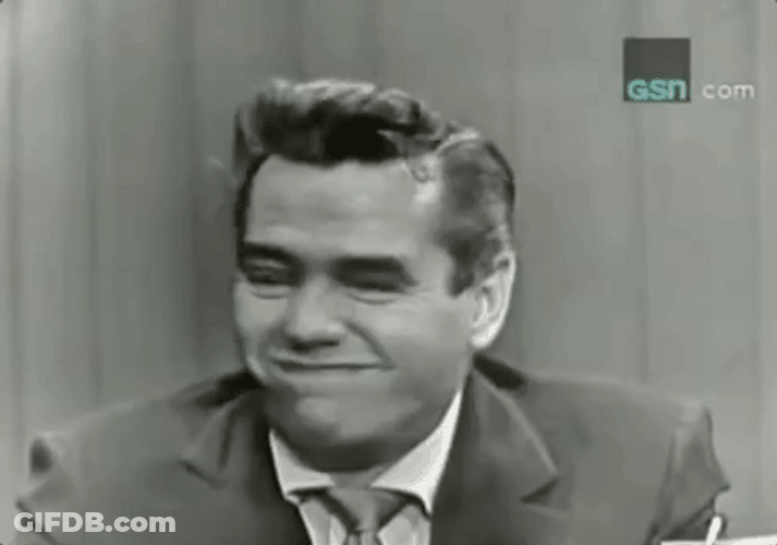 Man Holding Fake Laugh GIF
