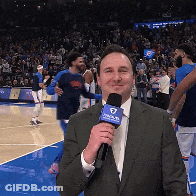 Man Holding FanDuel Microphone At Basketball Game GIF