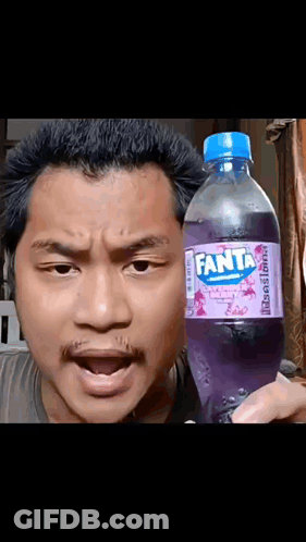 Man Holding Fanta Cherry Blossom GIF