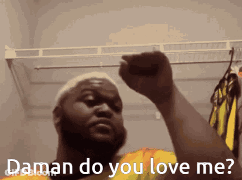 Man Holding Fist Saying Daman Do You Love Me GIF