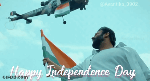 Man Holding Flag In Front Of Army Plane GIF