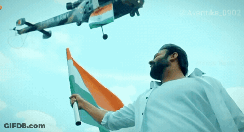 Man Holding Flag Near Helicopter Saying Army GIF