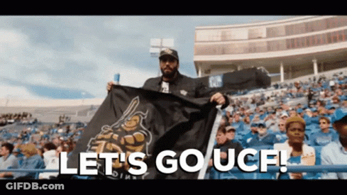 Man Holding Flag Says Let's Go UCF GIF