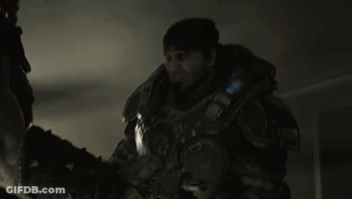 Man Holding Flamethrower With V On Hat GIF