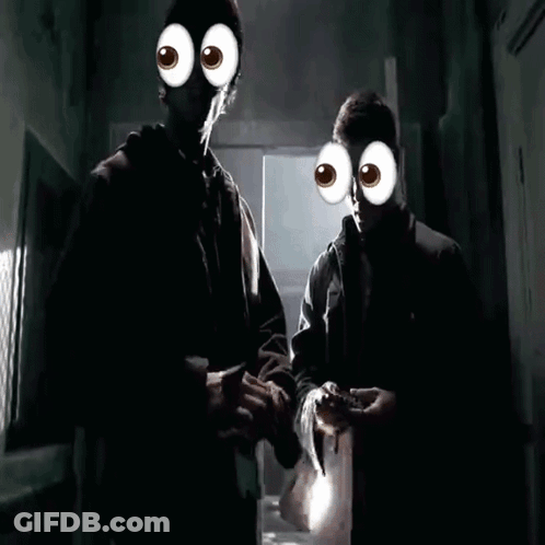 Man Holding Flashlight And Another Man With Googly Eyes GIF