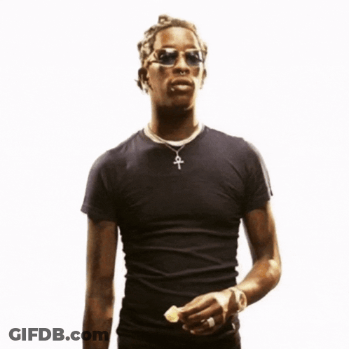 Man Holding Food And Ankh Necklace GIF