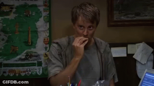 Man Holding Food In Front Of Ireland Map GIF