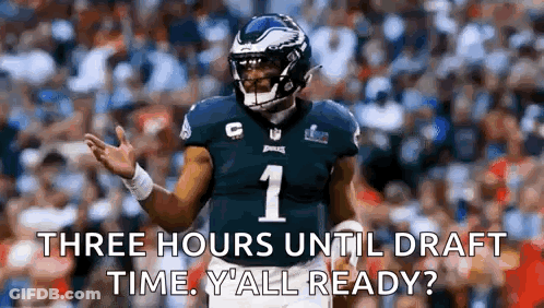 Man Holding Football In Front Of Primetime Sign GIF