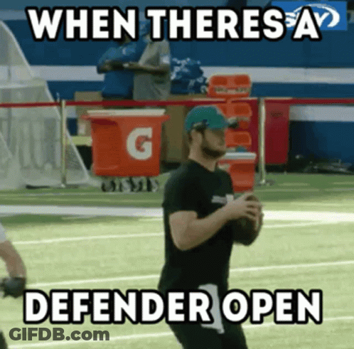 Man Holding Football With Caption When Theres A Defender Open GIF