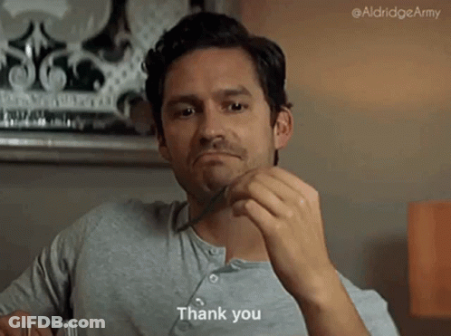 Man Holding Fork In Mouth Saying Thank You GIF