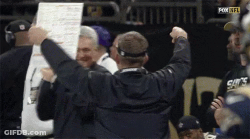 Man Holding Fox NFL Sign GIF