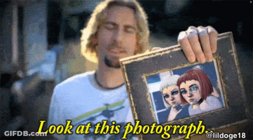 Man Holding Framed Picture Saying Look At This Photograph GIF