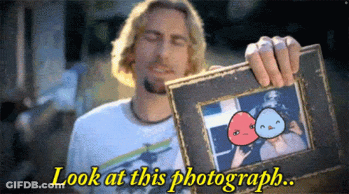 Man Holding Framed Picture Saying Look At This Photograph GIF