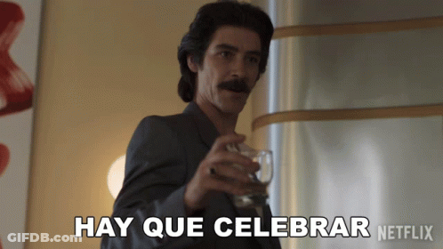 Man Holding Glass With Hay Que Celebrar GIF