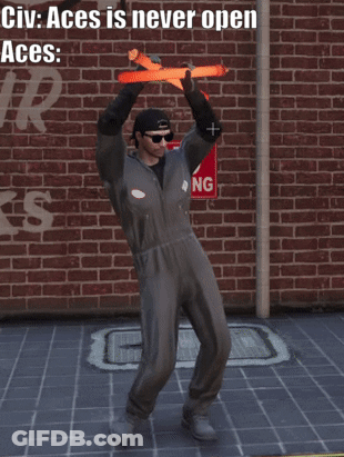 Man Holding Glow Sticks In Front Of Brick Wall With No Parking Sign GIF