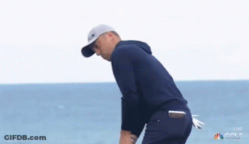 Man Holding Golf Club GIF