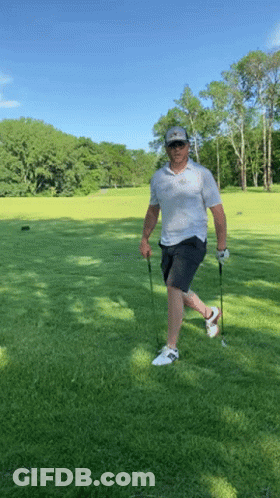 Man Holding Golf Club And Ball GIF