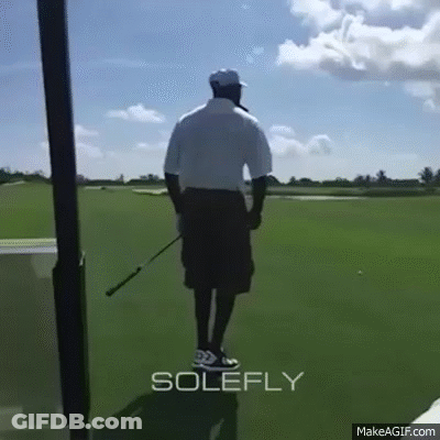 Man Holding Golf Club On Golf Course GIF
