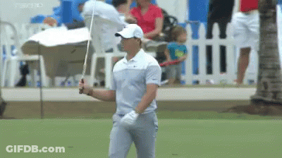 Man Holding Golf Club GIF