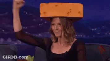 Man Holding Grater With Cheese Says Want A Little Wine With That Cheese GIF