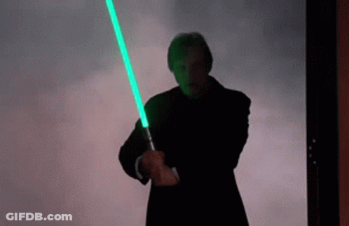 Man Holding Green Light Saber GIF