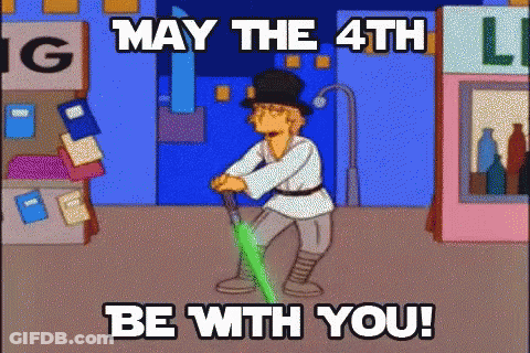 Man Holding Green Lightsaber May The 4Th Be With You GIF