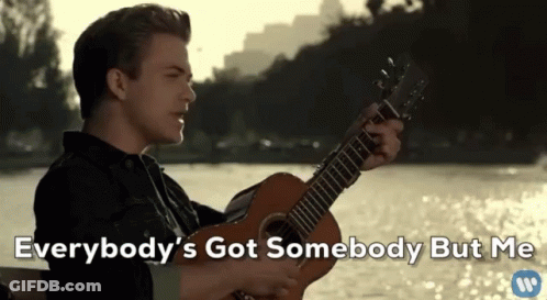 Man Holding Guitar Everybody's Got Somebody But Me GIF