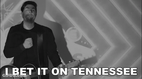 Man Holding Guitar Saying I Bet It On Tennessee GIF