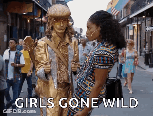 Man Holding Guitar Statue Woman Girls Gone Wild GIF