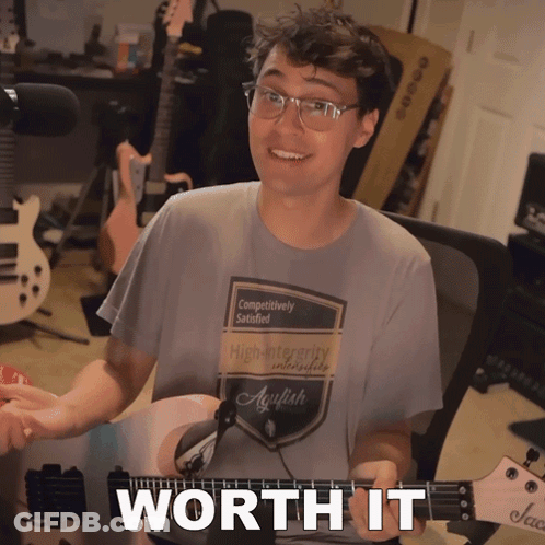 Man Holding Guitar With Worth It GIF