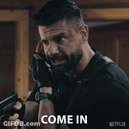 Man Holding Gun Come In GIF