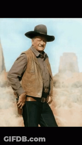 Man Holding Gun Cowboy Hat Leather Vest GIF