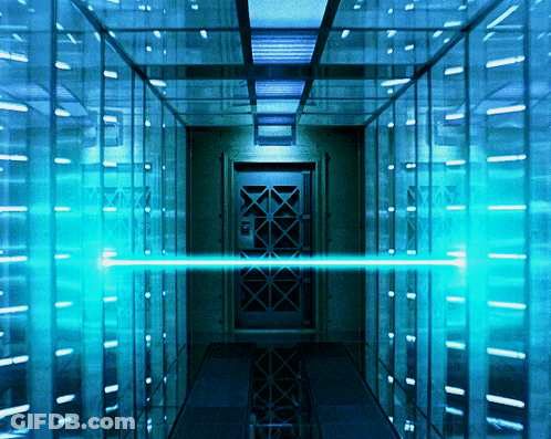 Man Holding Gun In Front Of Door With Giantmonster GIF