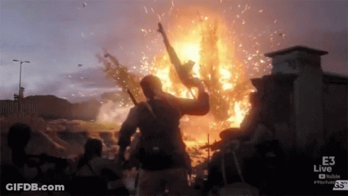 Man Holding Gun In Front Of Explosion With E3 Live Logo GIF