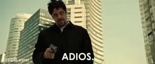 Man Holding Gun Saying Adios GIF