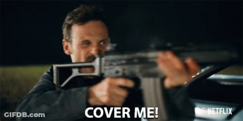 Man Holding Gun Saying Cover Me GIF
