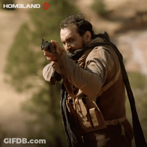 Man Holding Gun Saying Homeland GIF
