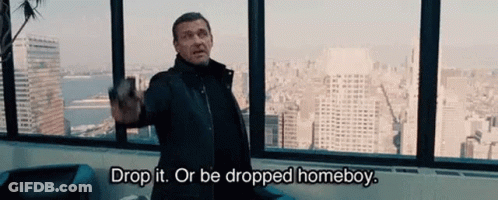 Man Holding Gun Says Drop It Or Be Dropped Homeboy GIF