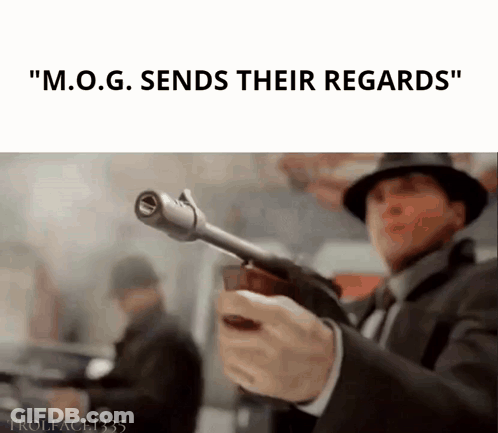 Man Holding Gun Says M.O.G. Sends Their Regards GIF