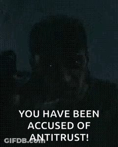 Man Holding Gun Says You Have Been Accused Of Antitrust! GIF