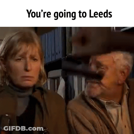 Man Holding Gun Sitting Next To Woman GIF