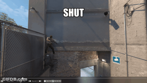 Man Holding Gun With Shut Above Him GIF