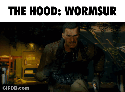 Man Holding Gun With Words The Hood Wormsur GIF