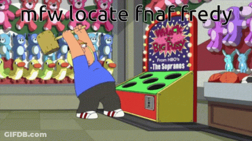 Man Holding Hammer At Whack-A-Mole Game GIF